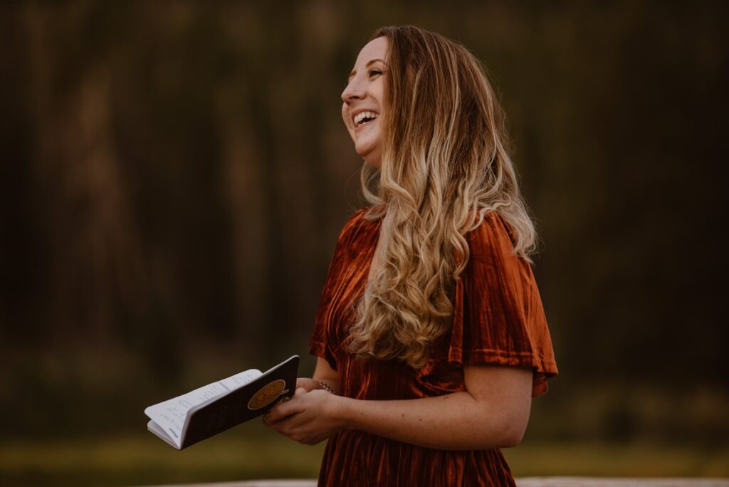 Officiant laughing during elopement ceremony