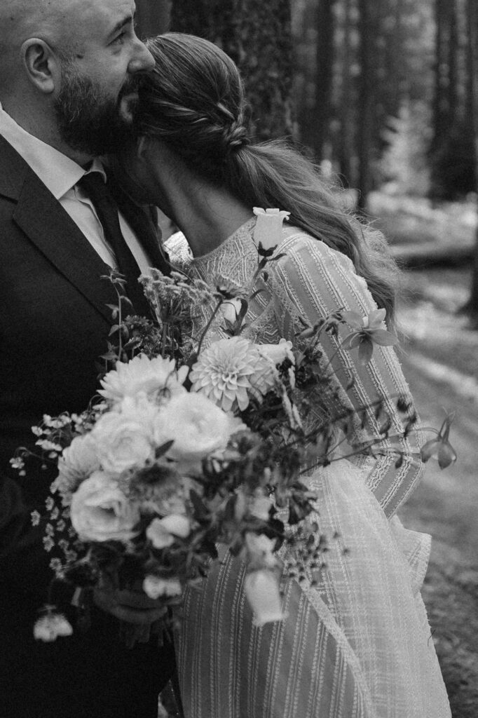 close up of couple snuggled together on their elopement day