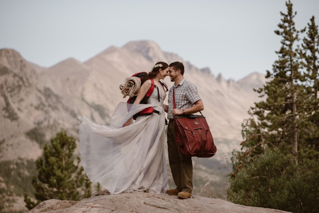 Bride and groom with Longs Peak in the distance