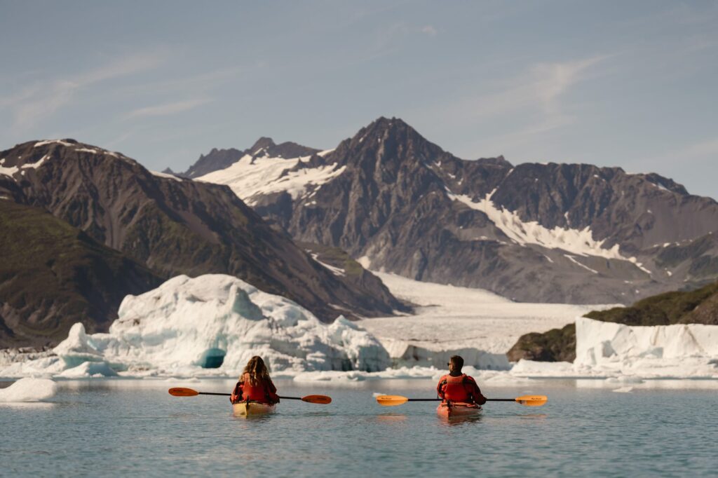 Kayaking at Bear Glacier in Alaska at adventure elopement