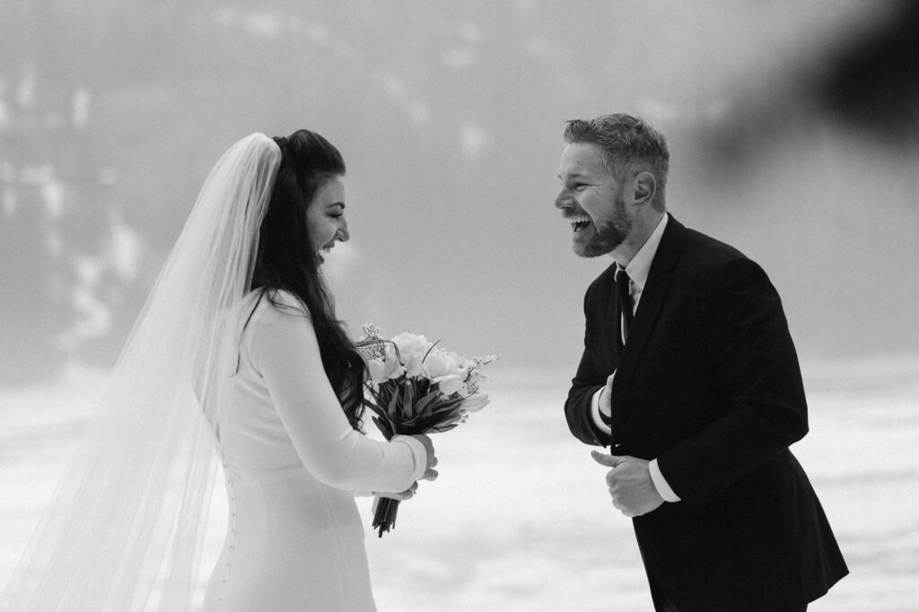 Couple laughing at their elopement ceremony