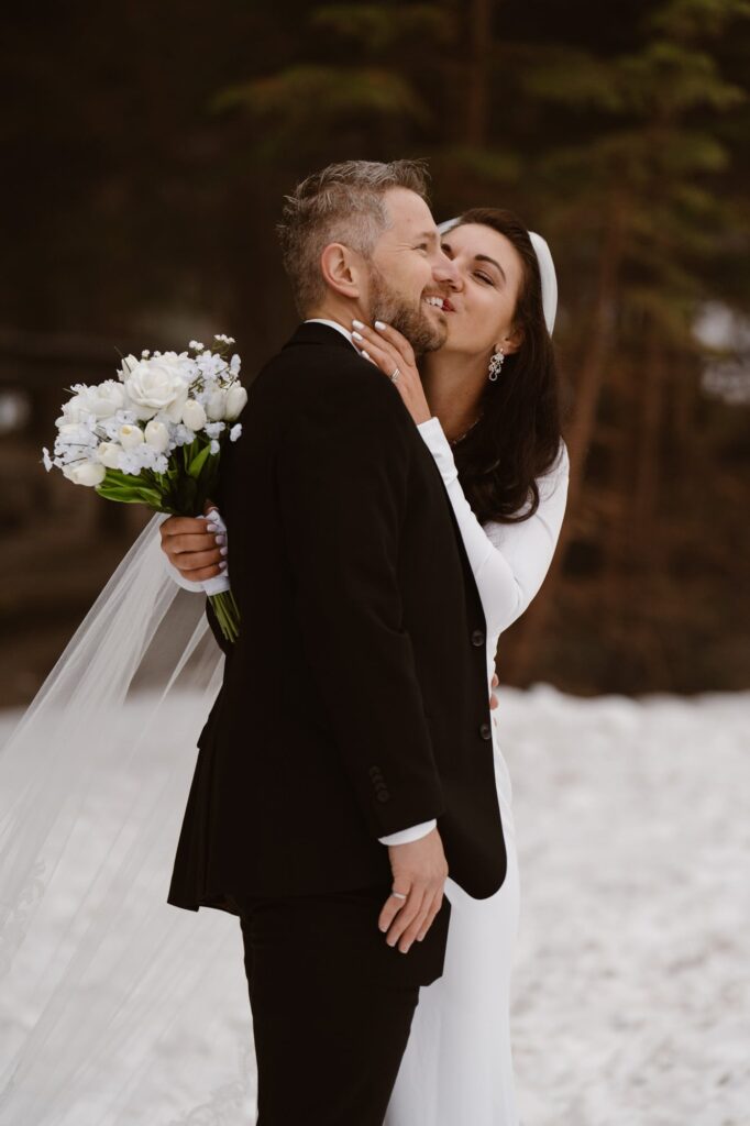 Couple kissing after their Bear Lake elopement