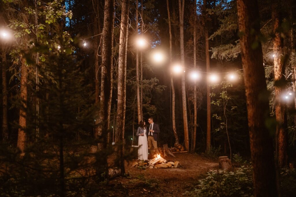 Eloping couple with a campfire and market lights