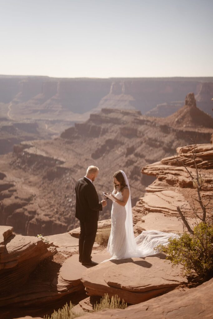 Adventure elopement ceremony on a cliff in Moab