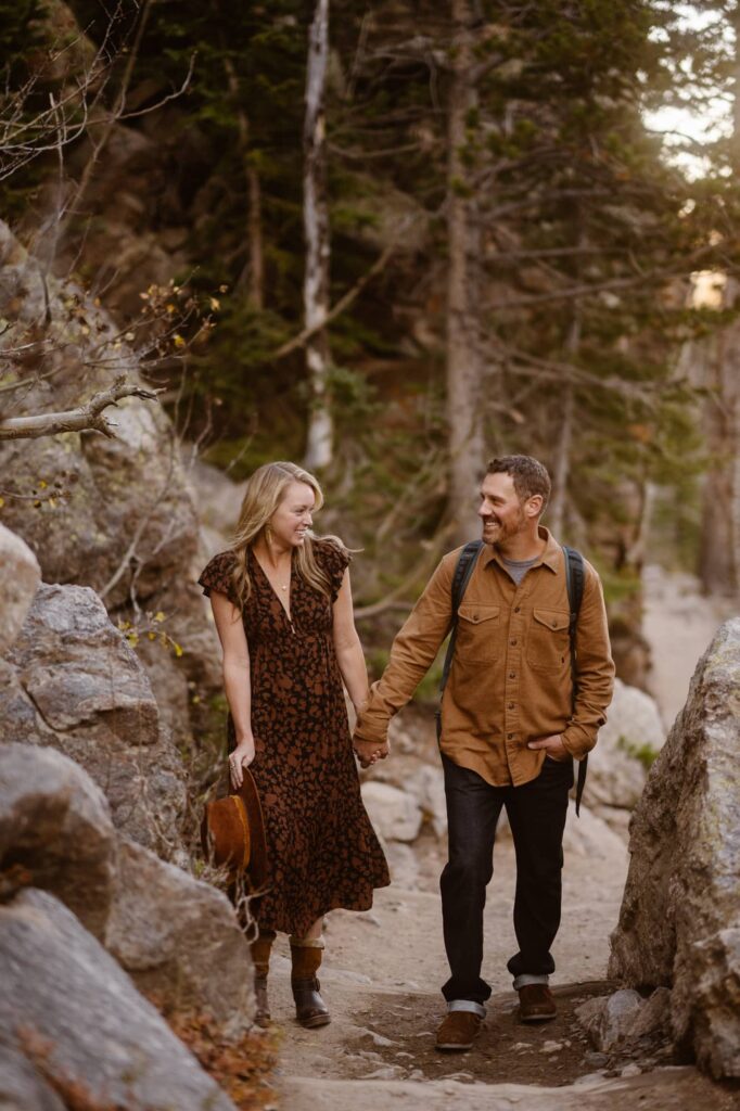 Couple hiking off into the mountains