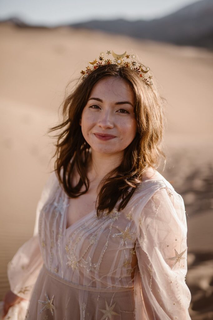 Portrait of a bride in a colored wedding dress with stars