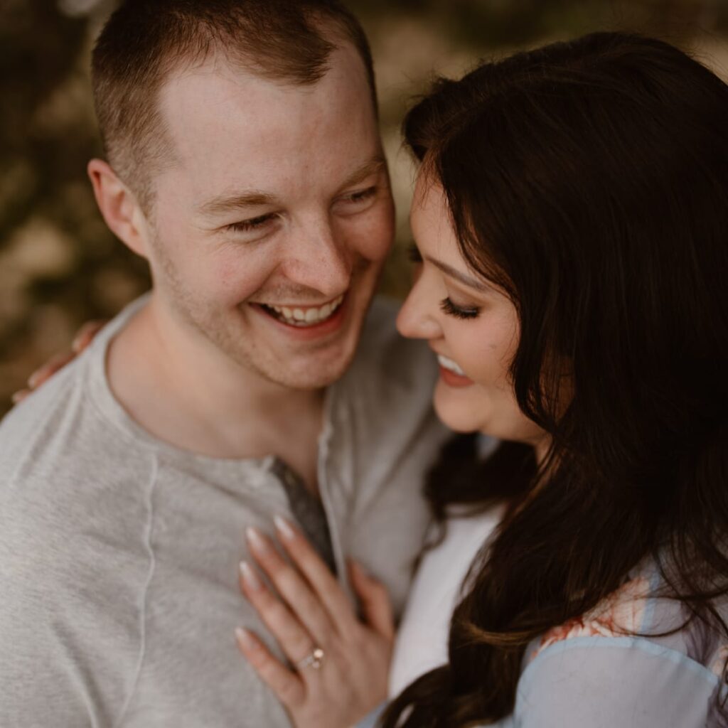 Romantic and playful engagement photos in the mountains