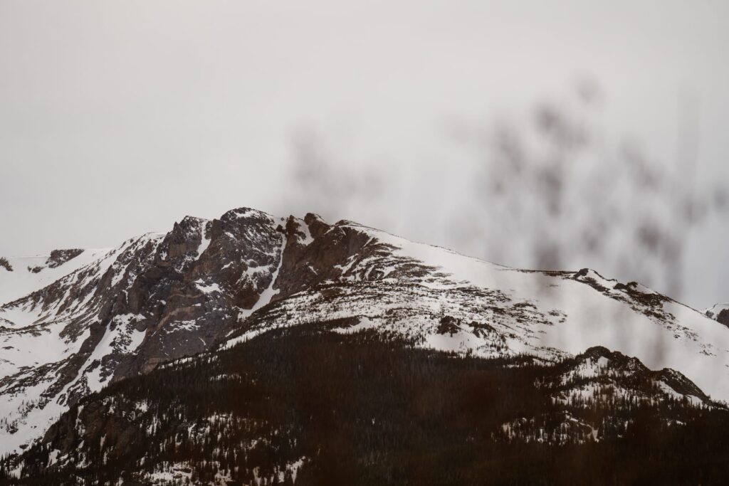 Snowy mountain view from Sprague Lake in Estes Park, Colorado