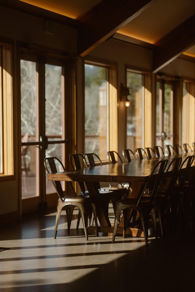 Table and chairs in the reception area at Estes Park wedding venue