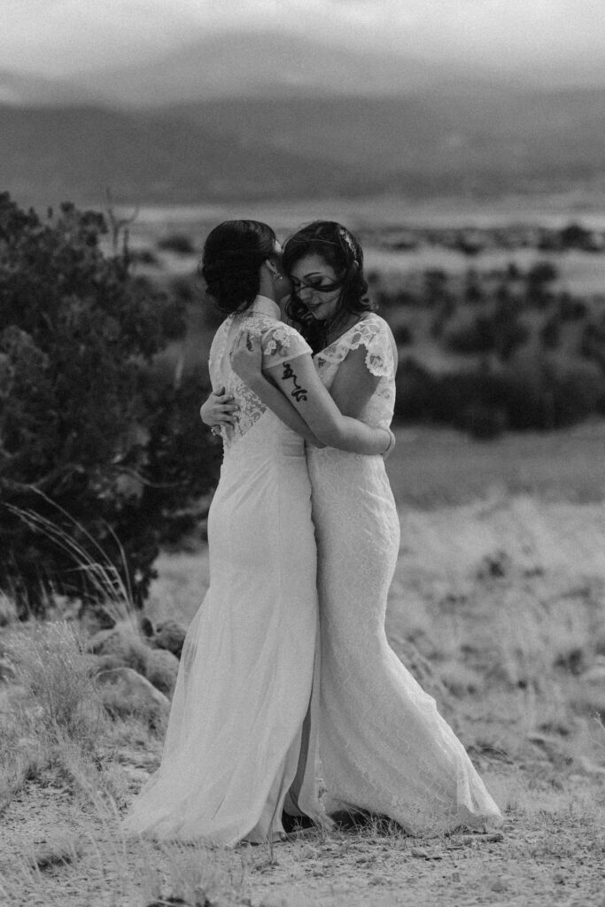 Romantic image of two brides at Ghost Ranch wedding