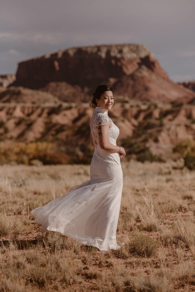 Bride in the desert with high neck dress
