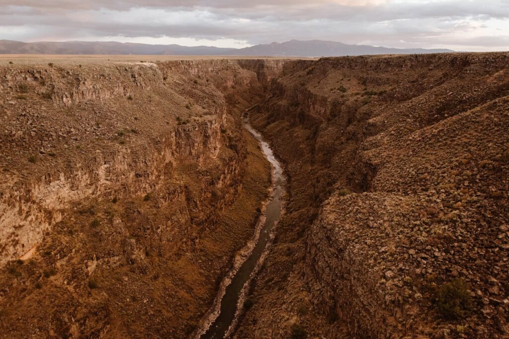 View of desert gorge at sunset