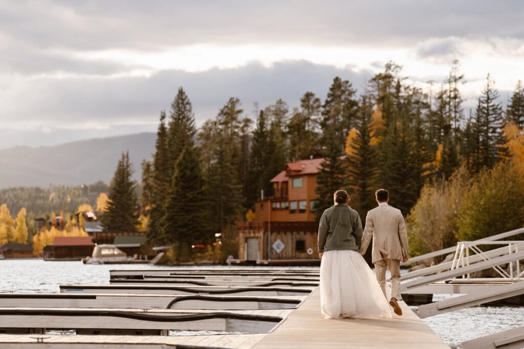 Bride and groom on boat dock