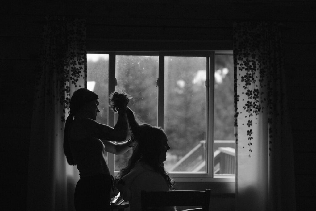 Bride getting hair done before elopement