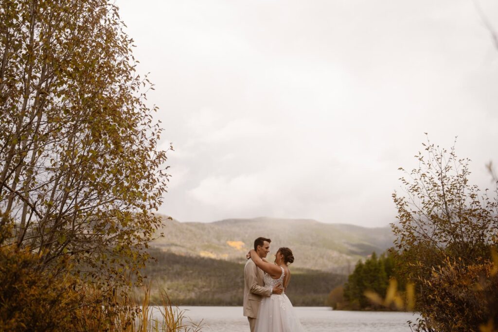 Romantic couple dancing on their own by the water