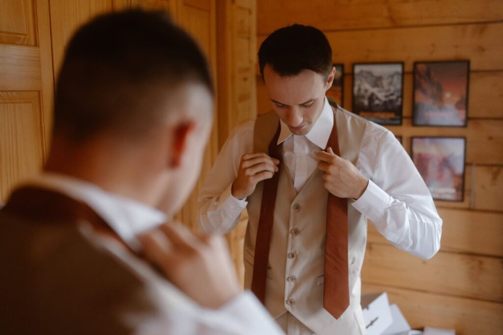 Groom putting final touches on before his wedding day