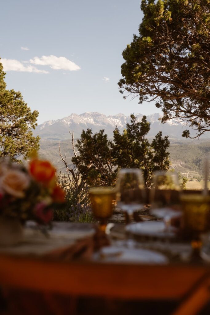 View of mountains behind wedding outdoor tablescape