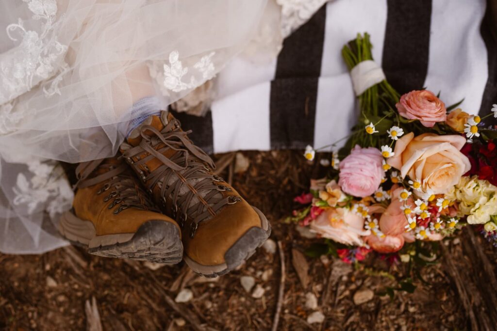 Hiking boots and wedding bouquet