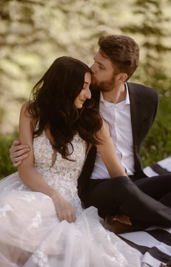 Wedding day picnic with bride and groom