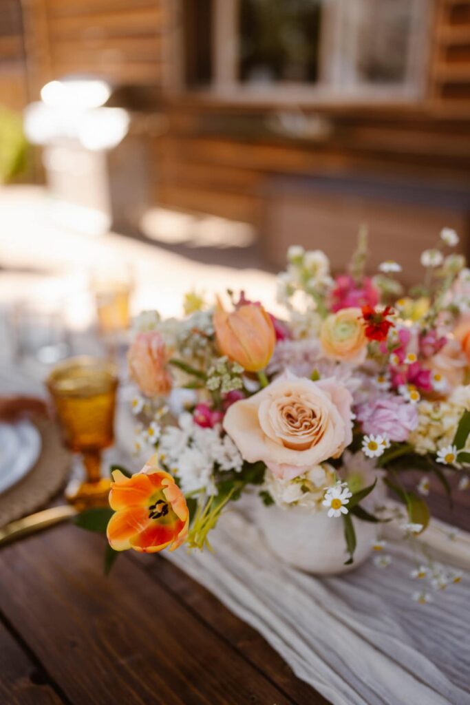 Romantic tablescape for outdoor wedding in Colorado