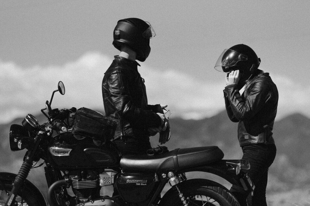 Biker couple taking wedding photos