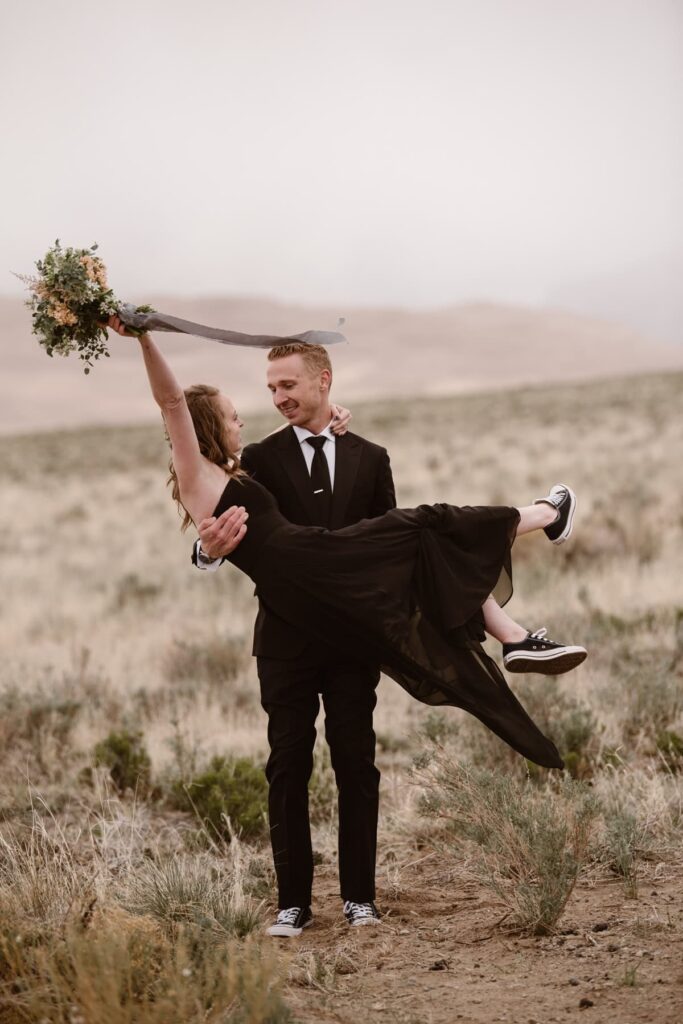 Couple with all black wedding outfit