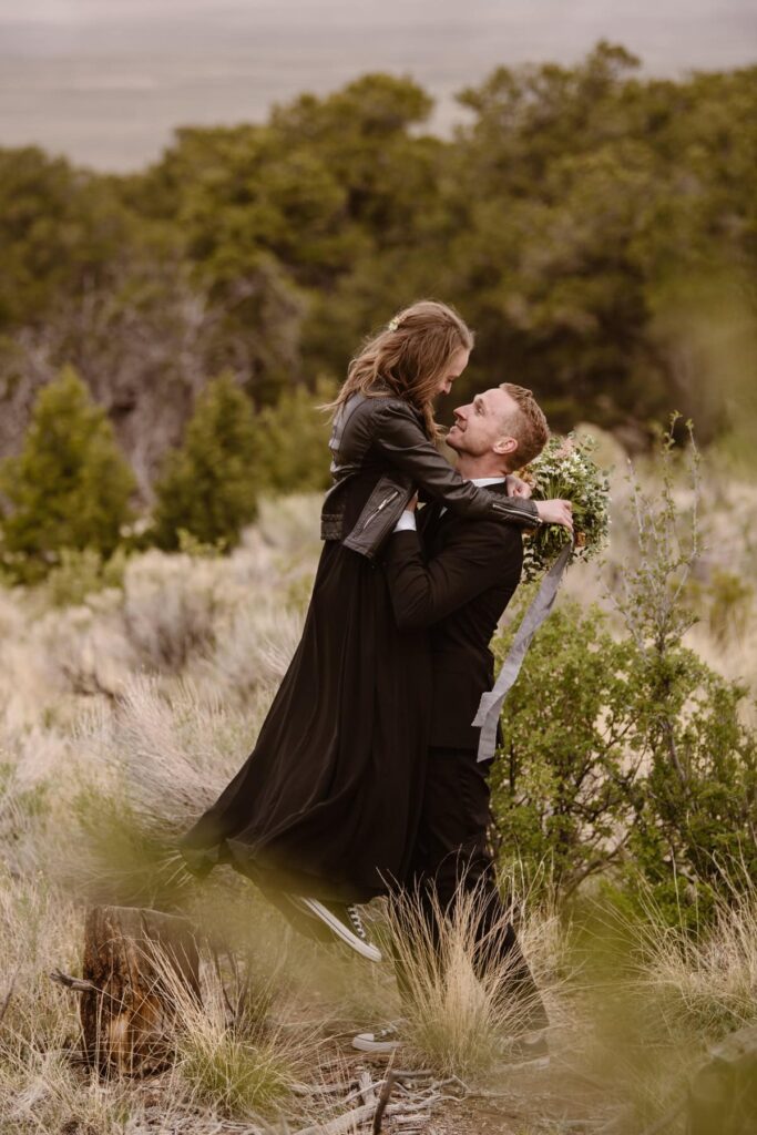 Couple in all black wedding outfit exploring Great Sand Dunes National Park