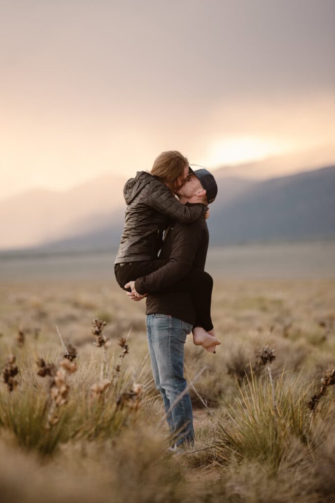 Couples portraits in a mountain meadow