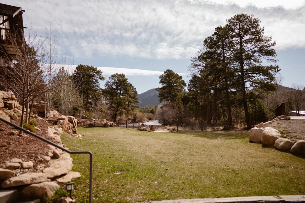 The outdoor wedding ceremony lawn at The Landing at Estes Park