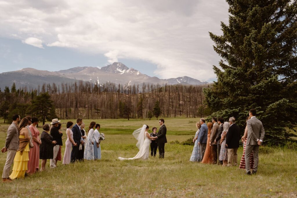 Estes Park micro wedding ceremony outdoors at Upper Beaver Meadows