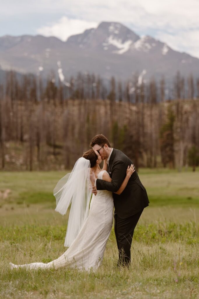 Couple shares a first kiss at Upper Beaver Meadows in RMNP