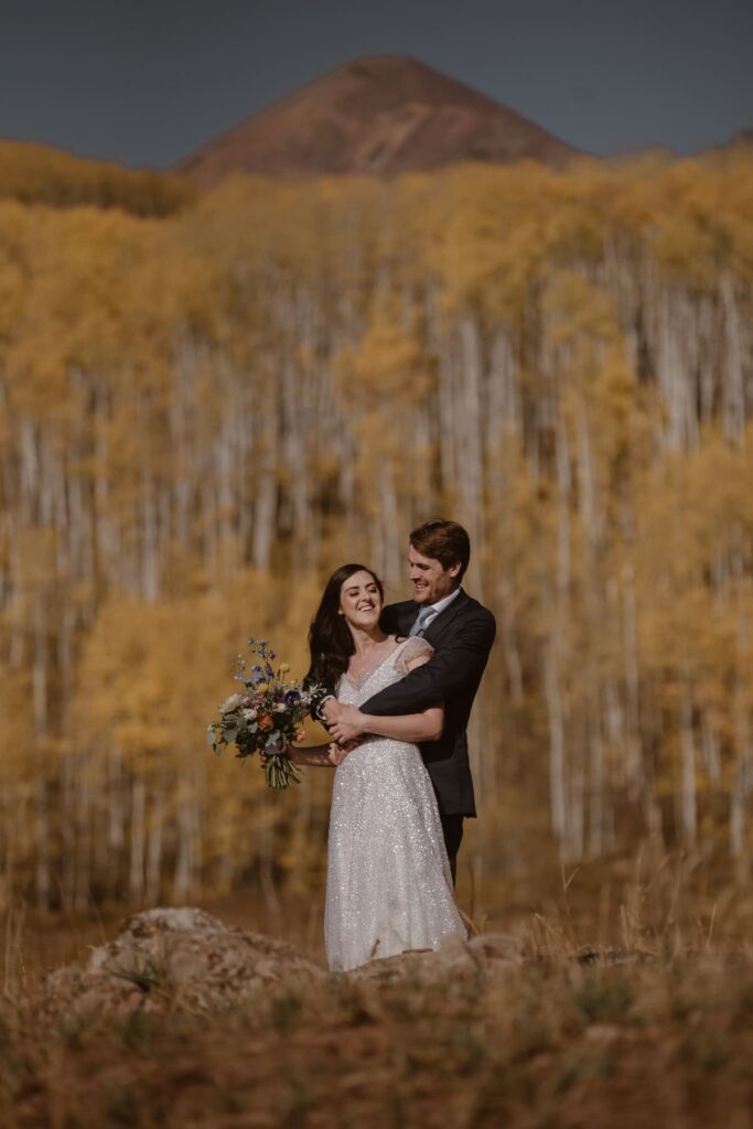 Wedding photos in Crested Butte along Kebler Pass in the fall time