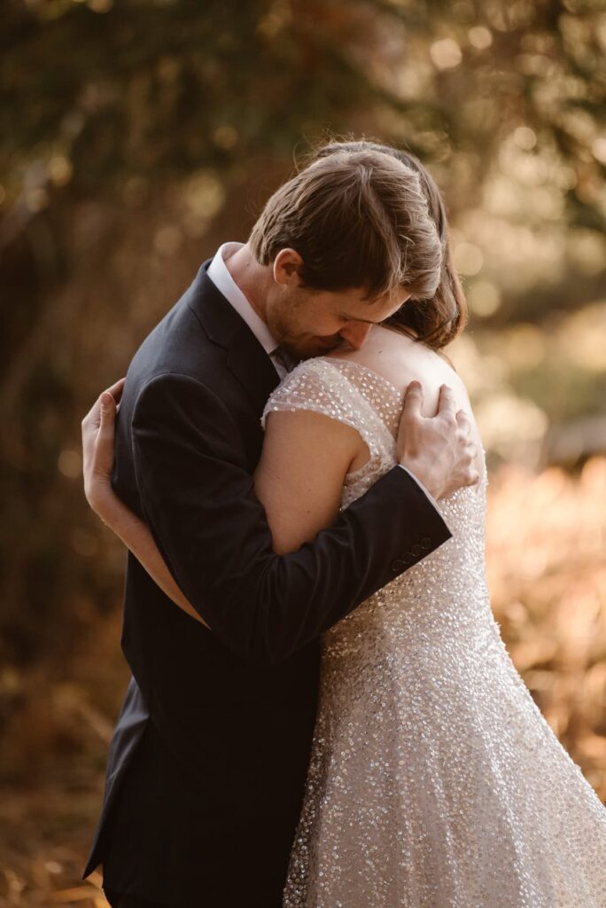 Couple embracing on their wedding day