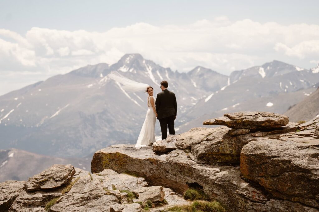 Mountaintop wedding photos with bride and groom in Estes Park