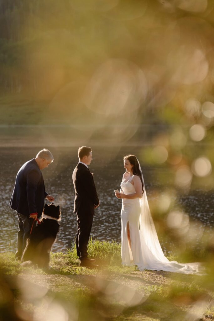 Couple exchanging vows at sunrise wedding ceremony