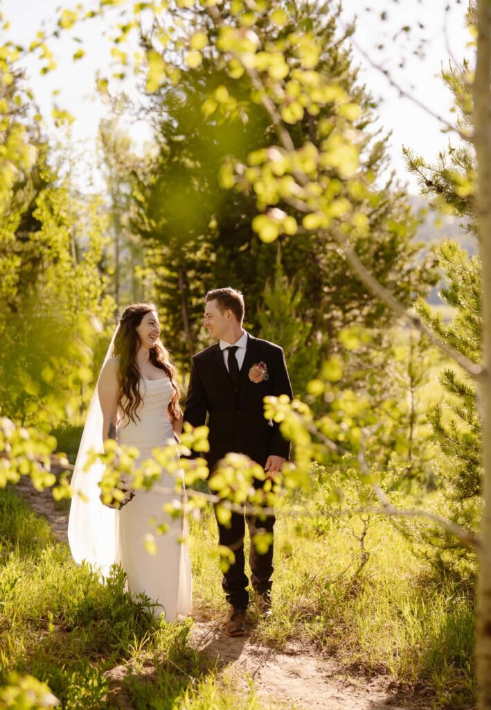 Bride and groom in the aspen grove at Pearl Lake