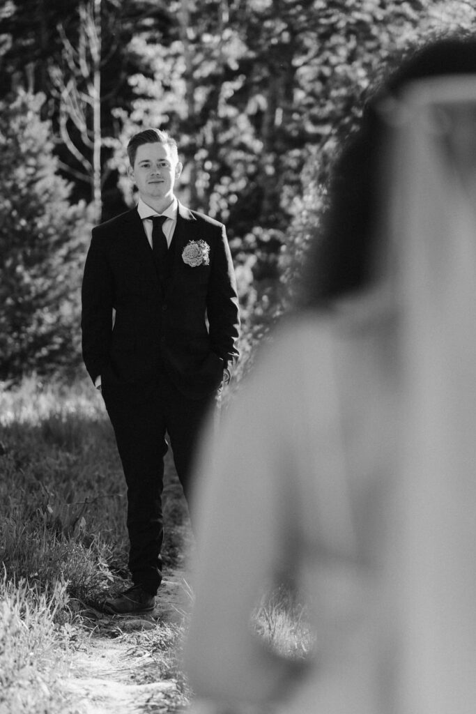 Bride looking toward her groom