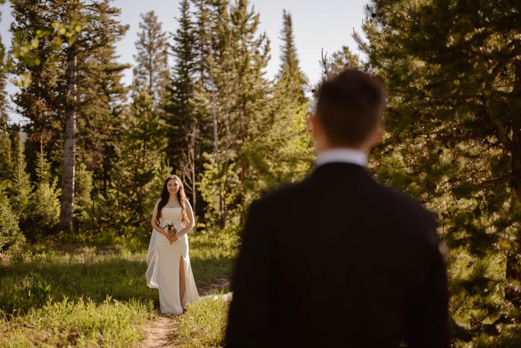 Groom looking toward his bride 