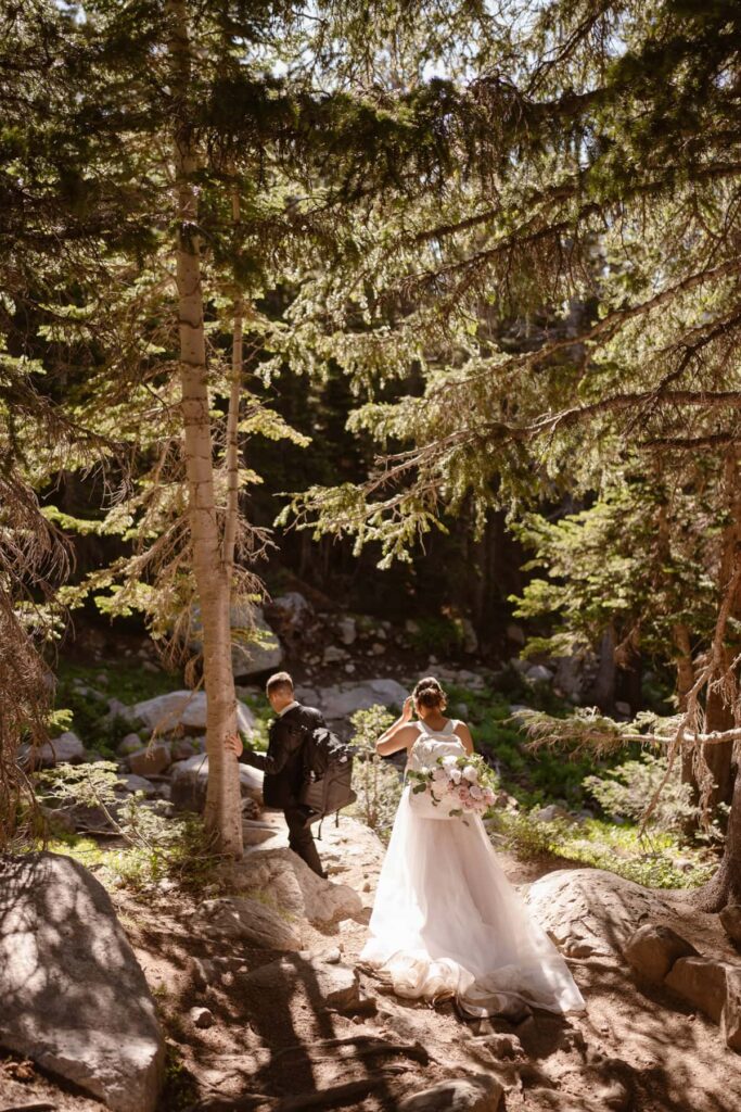 Couple hiking through a forest