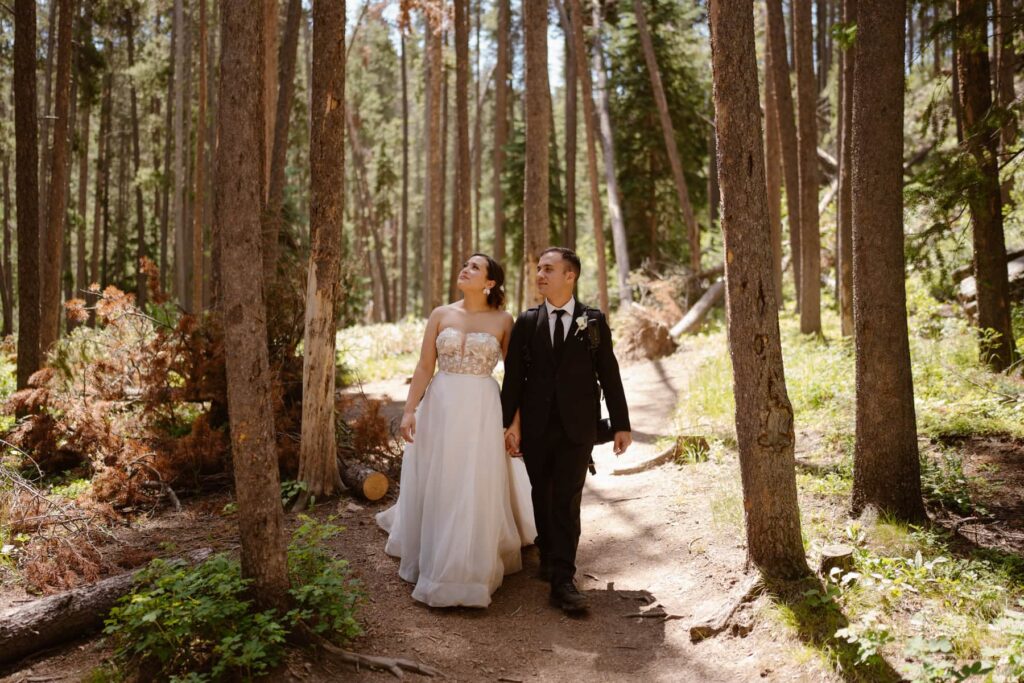 Couple hiking down a dirt path