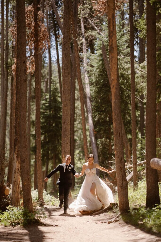 Frolicking bride and groom