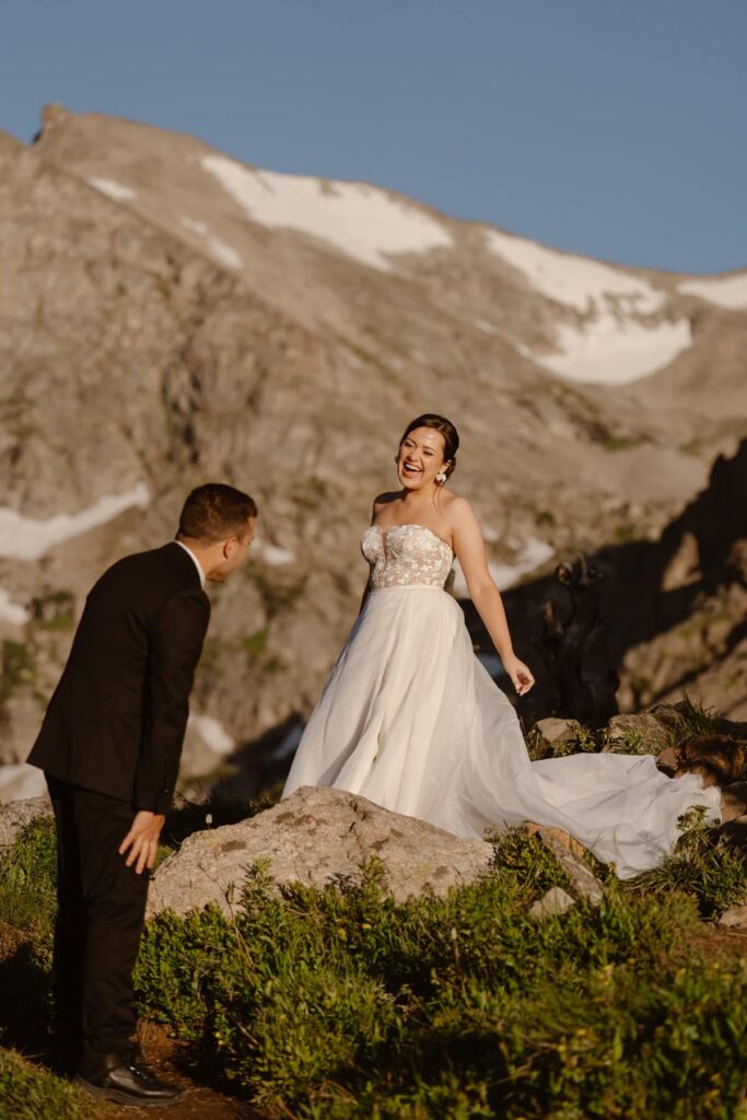 Bride and groom laughing and crying