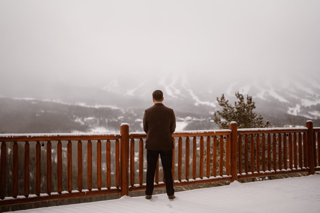 Groom on the deck of The Lodge at Breckenridge