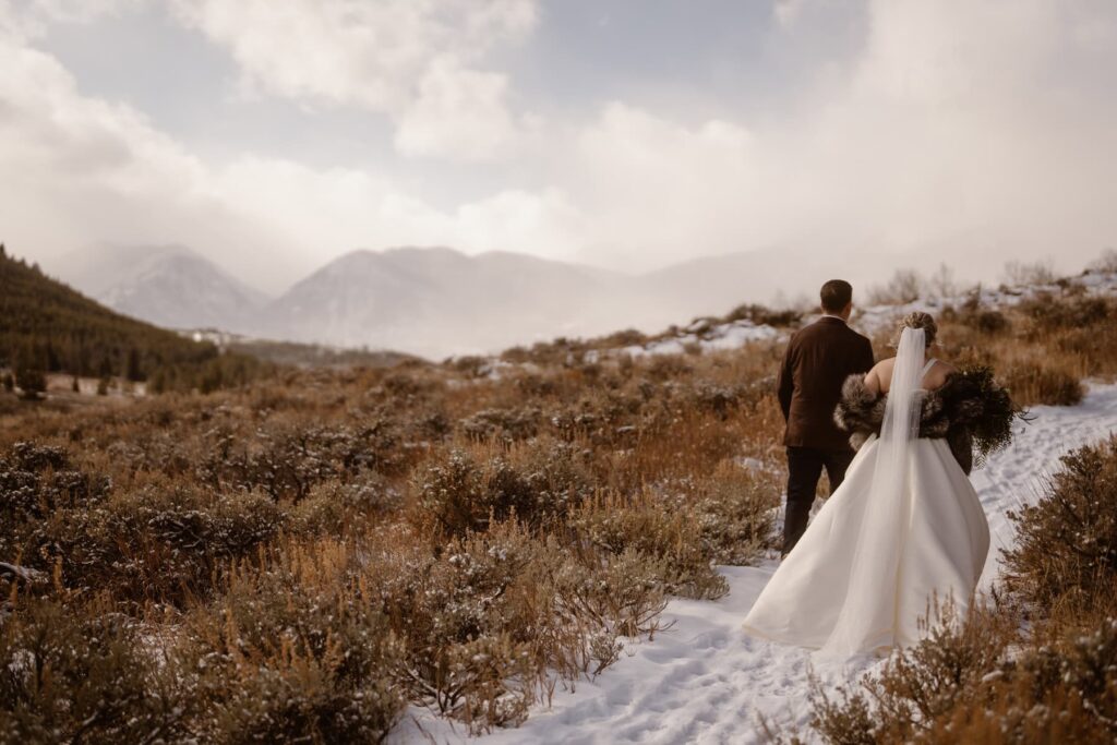 Bride and groom in the snowy Colorado mountains