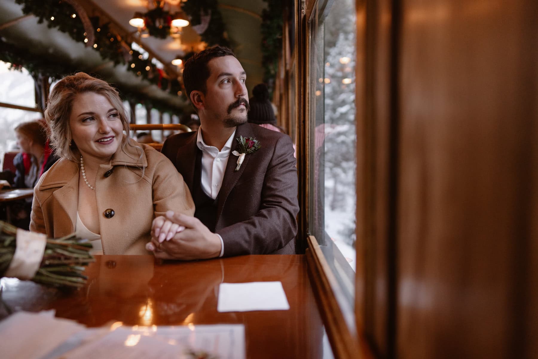 Bride and groom on Georgetown Loop train in the winter