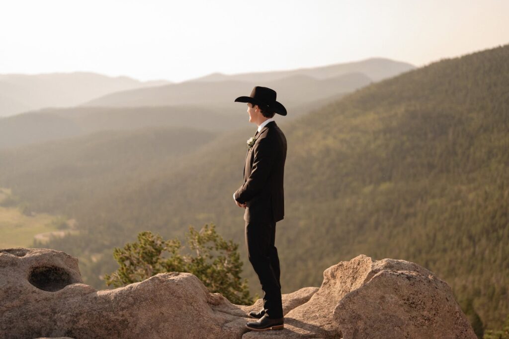 Groom portraits on top of a mountain