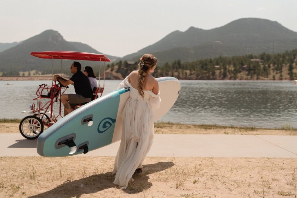 Bride and a stand up paddleboard