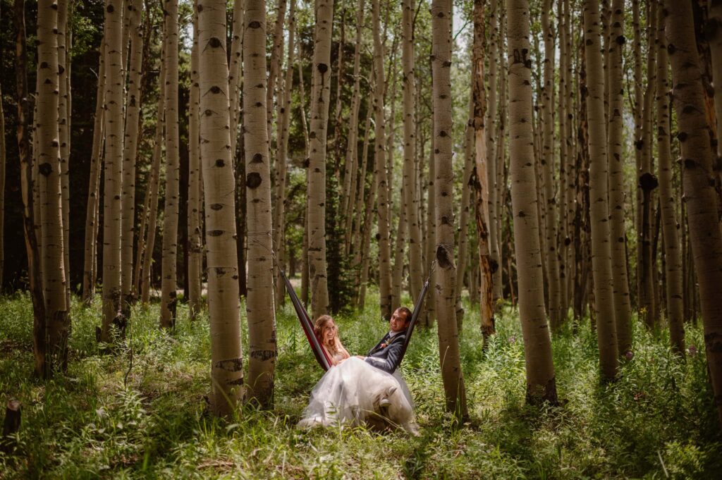 Bride and groom in a hammock