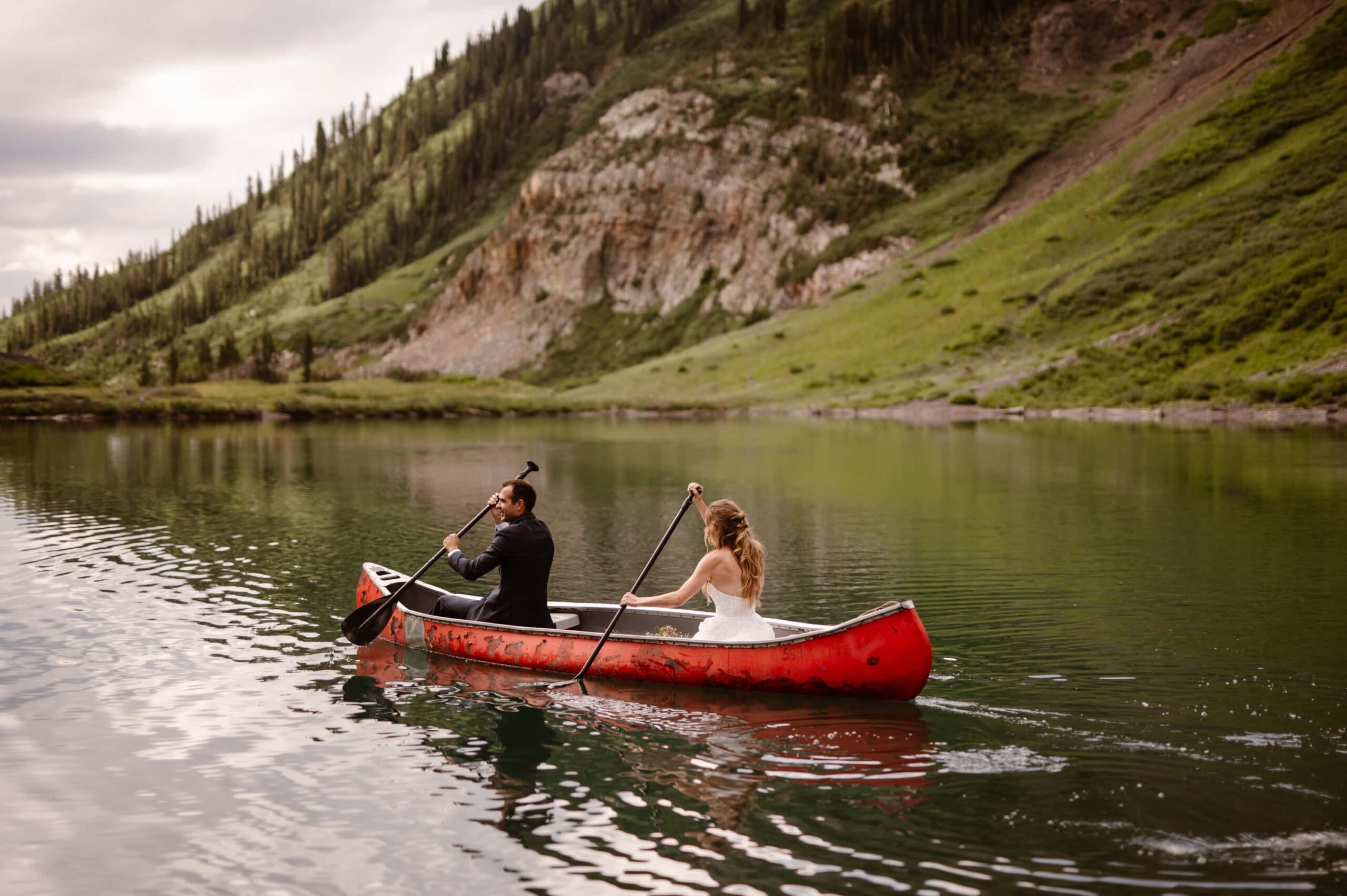 Bride and groom in a canoe