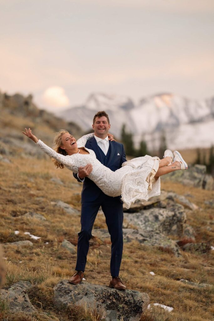 Silly bride and groom photos in the mountains